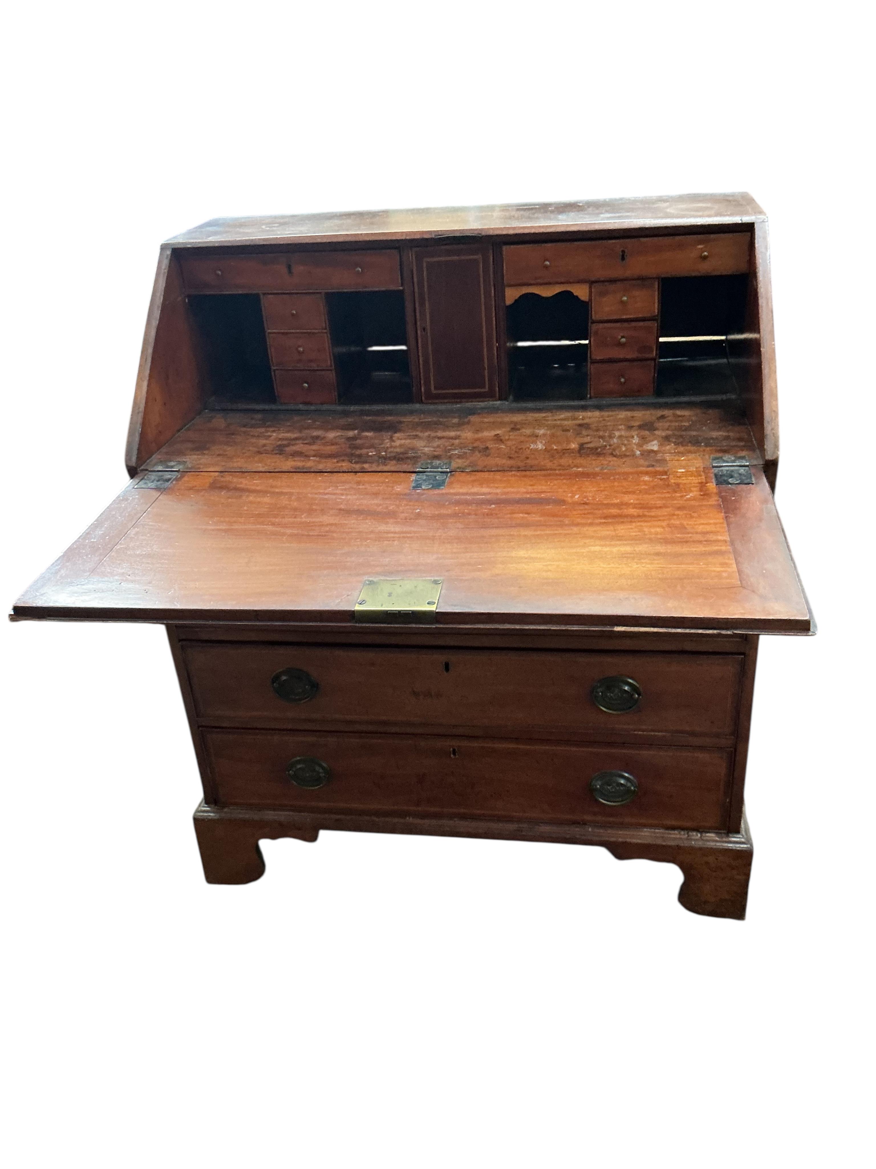 A George III mahogany bureau, with four long drawers on bracket feet, width 91cm, depth 53cm, height 108cm